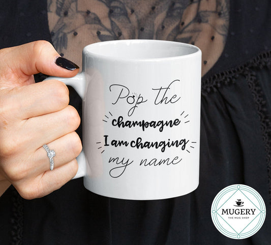 Pop the Champagne I am Changing My Name Mug